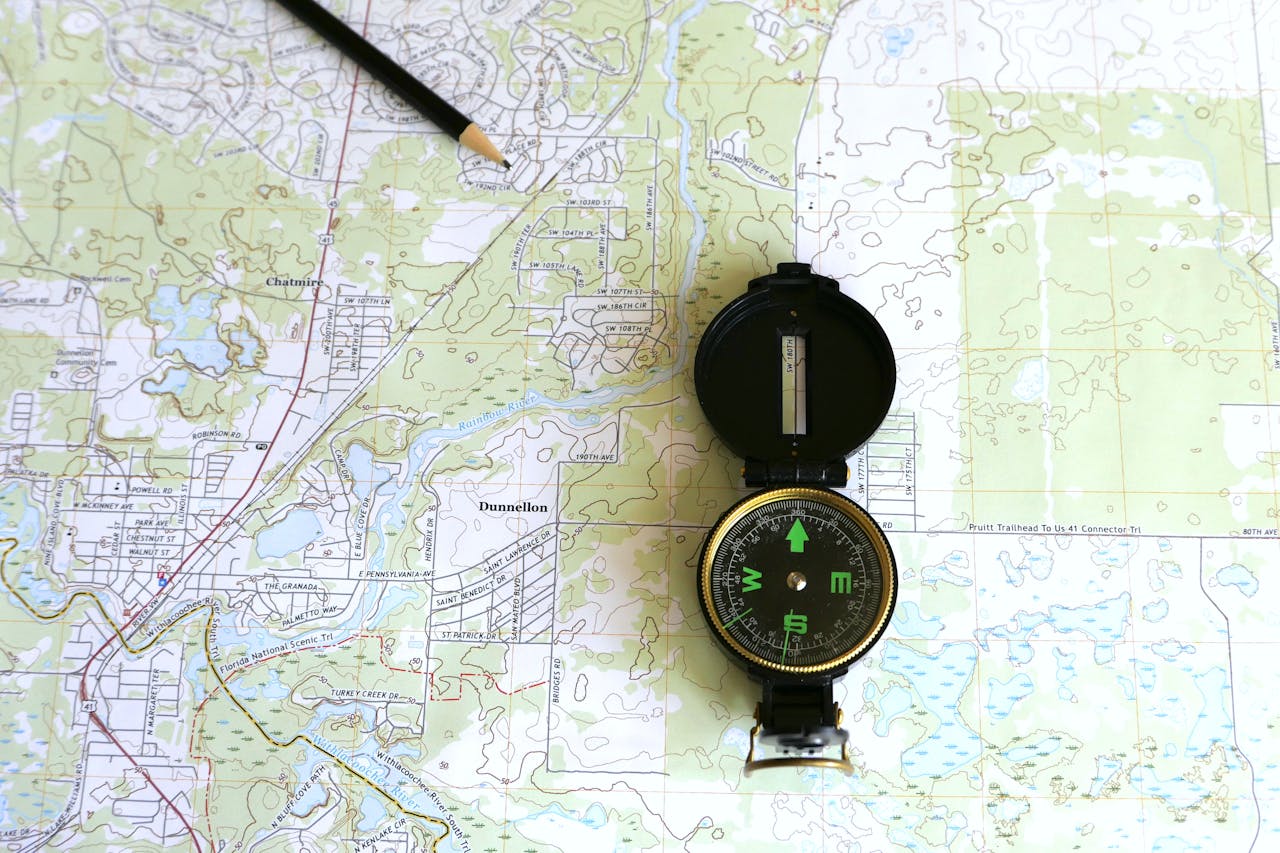services-02 A detailed topographic map of Dunnellon, Florida with a compass and pencil.